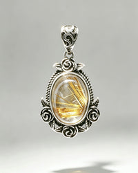 Golden Rutile Crystal Pendant – Oval Silver