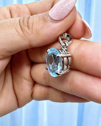 Blue Topaz Crystal Pendant – Oval Silver