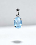 Blue Topaz Crystal Pendant – Oval Silver