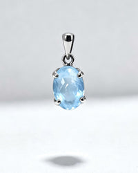 Blue Topaz Crystal Pendant – Oval Silver