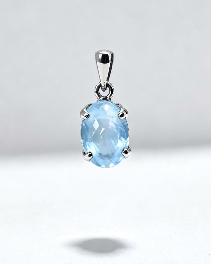 Blue Topaz Crystal Pendant – Oval Silver