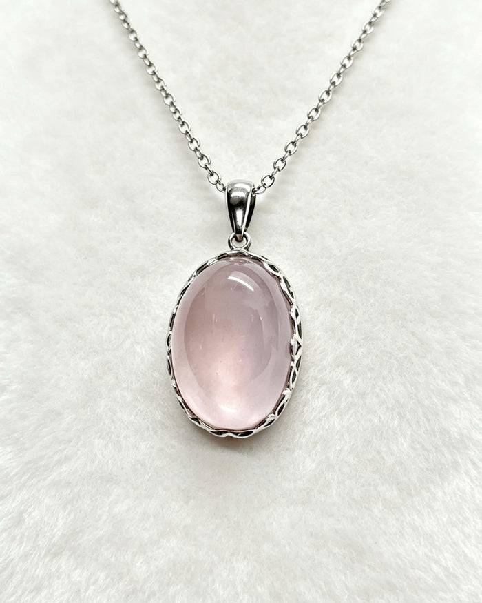 Rose Quartz Crystal Pendant – Oval Silver