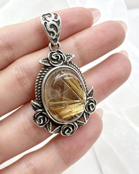 Golden Rutile Crystal Pendant – Oval Silver